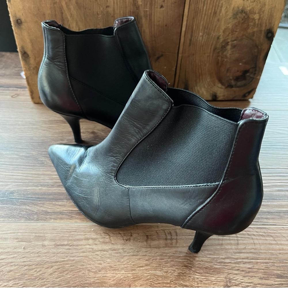 Ellen Tracy black slim heel booties.
